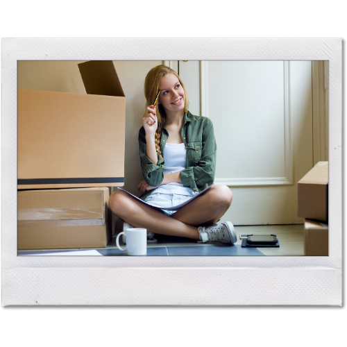 Picture of a young woman in her rental property covered by insurance.